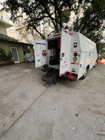 Magnet Plumbing service vehicle on-site for Grease Trap Cleaning in Orangewood Wheeler Oaks